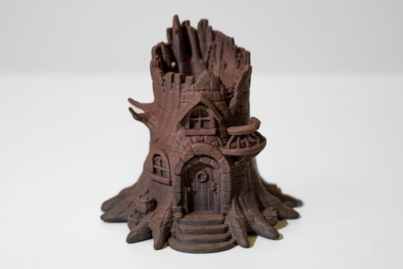 3D-printed miniature treehouse model on a white background